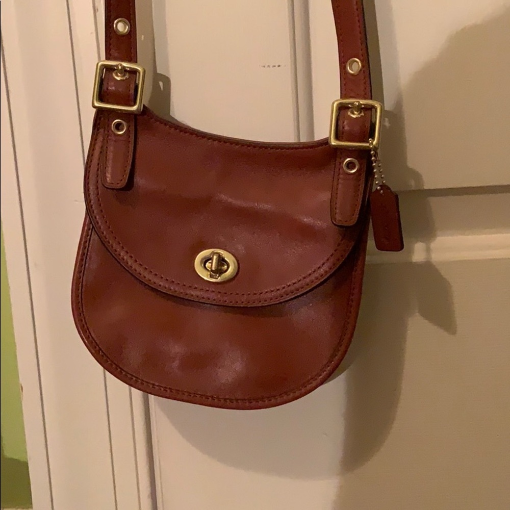 Coach mini brown leather saddle bag